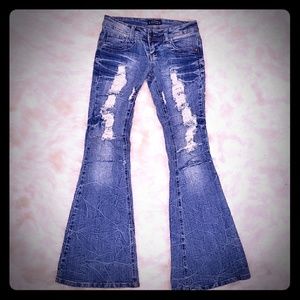 Distressed low rise flare jeans